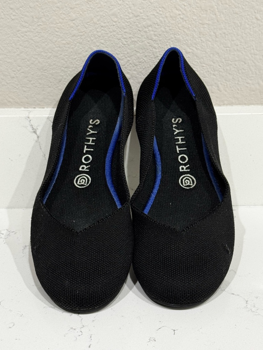 Rothy's Black Ballet Flats with Blue Trim
